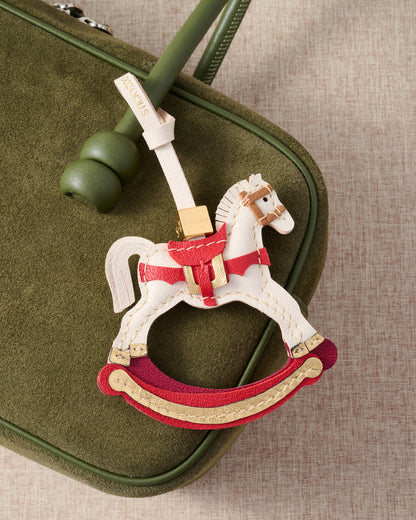 THE ROCKING HORSE CHARM
