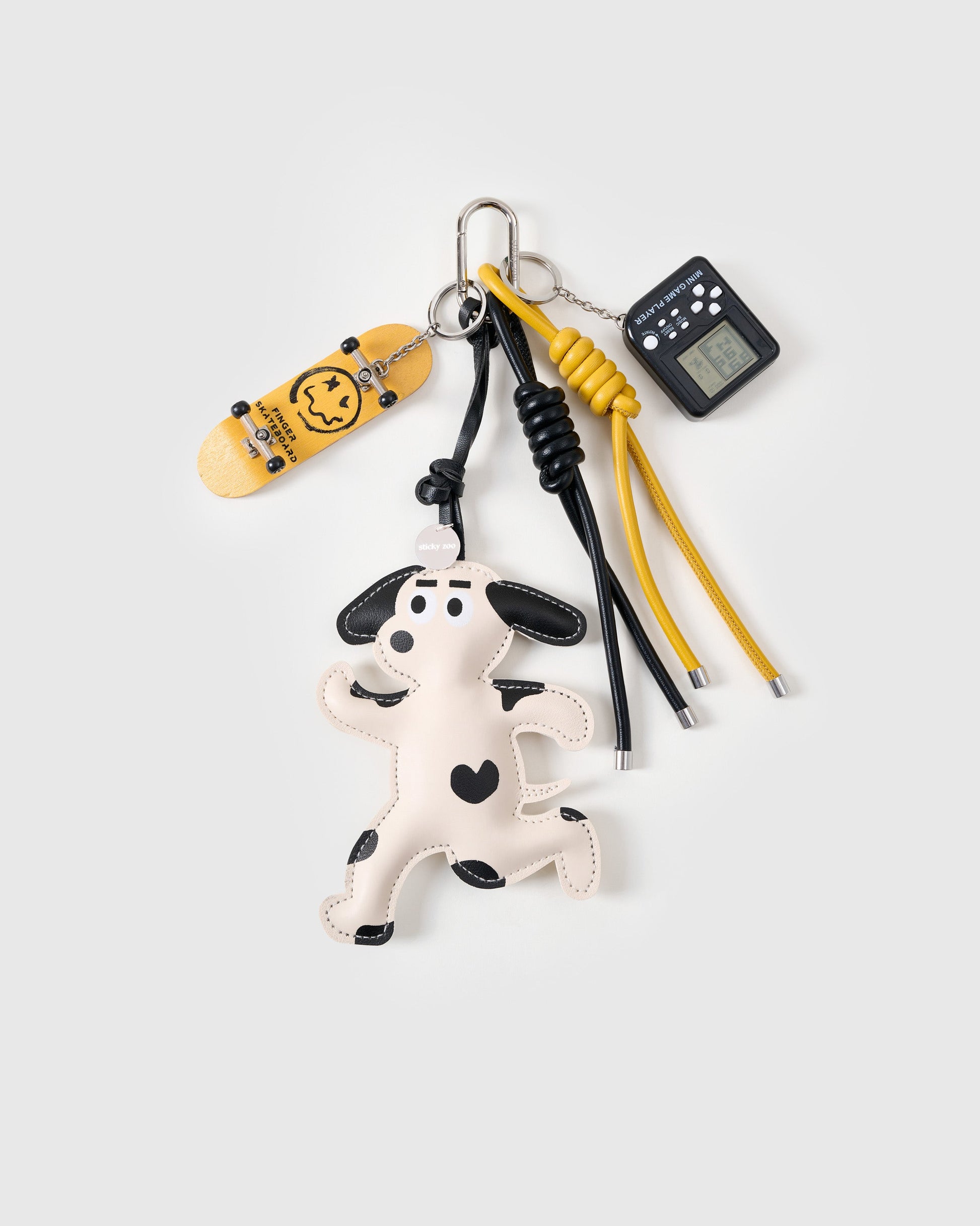 SKATER PUP STACK CHARM