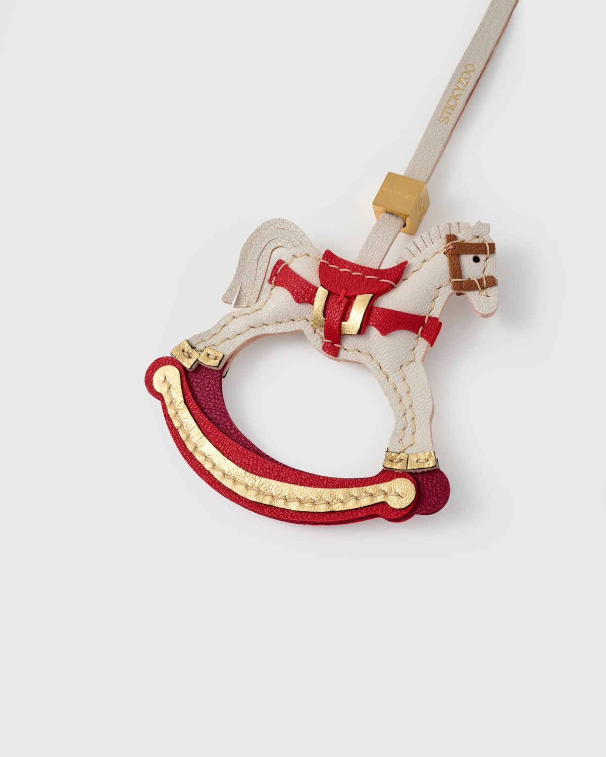 THE ROCKING HORSE CHARM