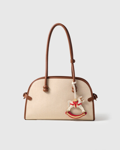 THE ROCKING HORSE CHARM