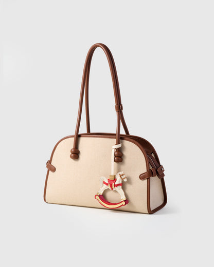 THE ROCKING HORSE CHARM