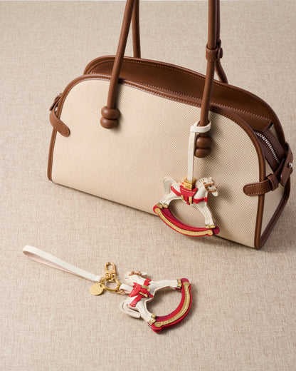 THE ROCKING HORSE CHARM